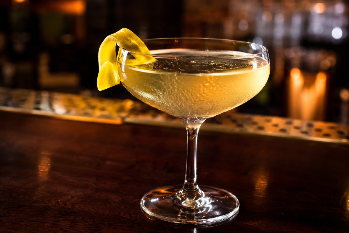 Bee's Knees cocktail - gin-based served in a glass with garnish