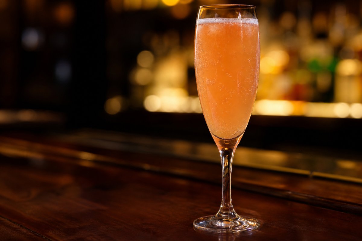 Bellini cocktail - other-based served in a glass with garnish