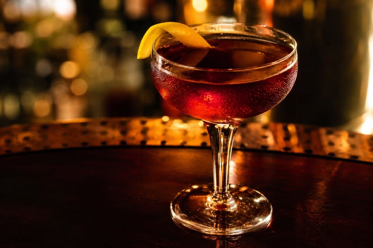Bijou cocktail - gin-based served in a glass with garnish