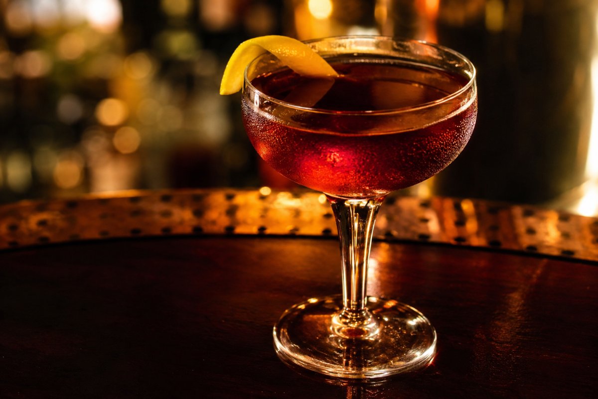 Bijou cocktail - gin-based served in a glass with garnish