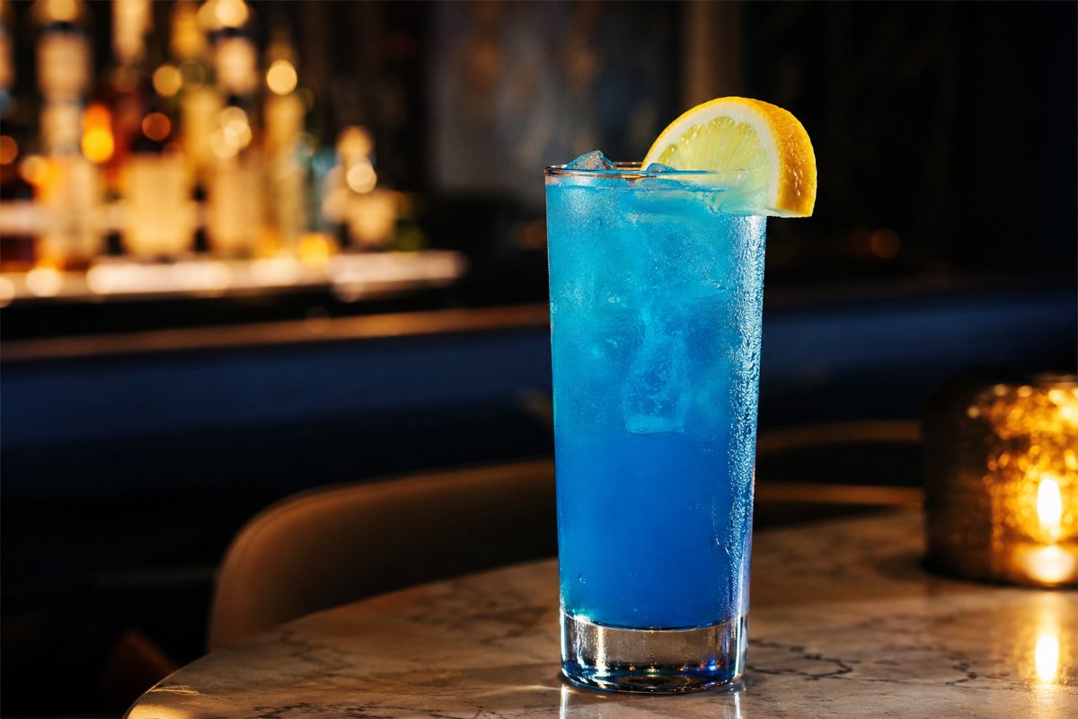 Blue Lagoon cocktail - vodka-based served in a glass with garnish