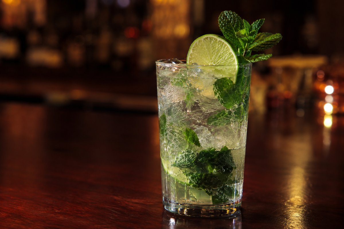 Mojito cocktail - rum-based served in a glass with garnish