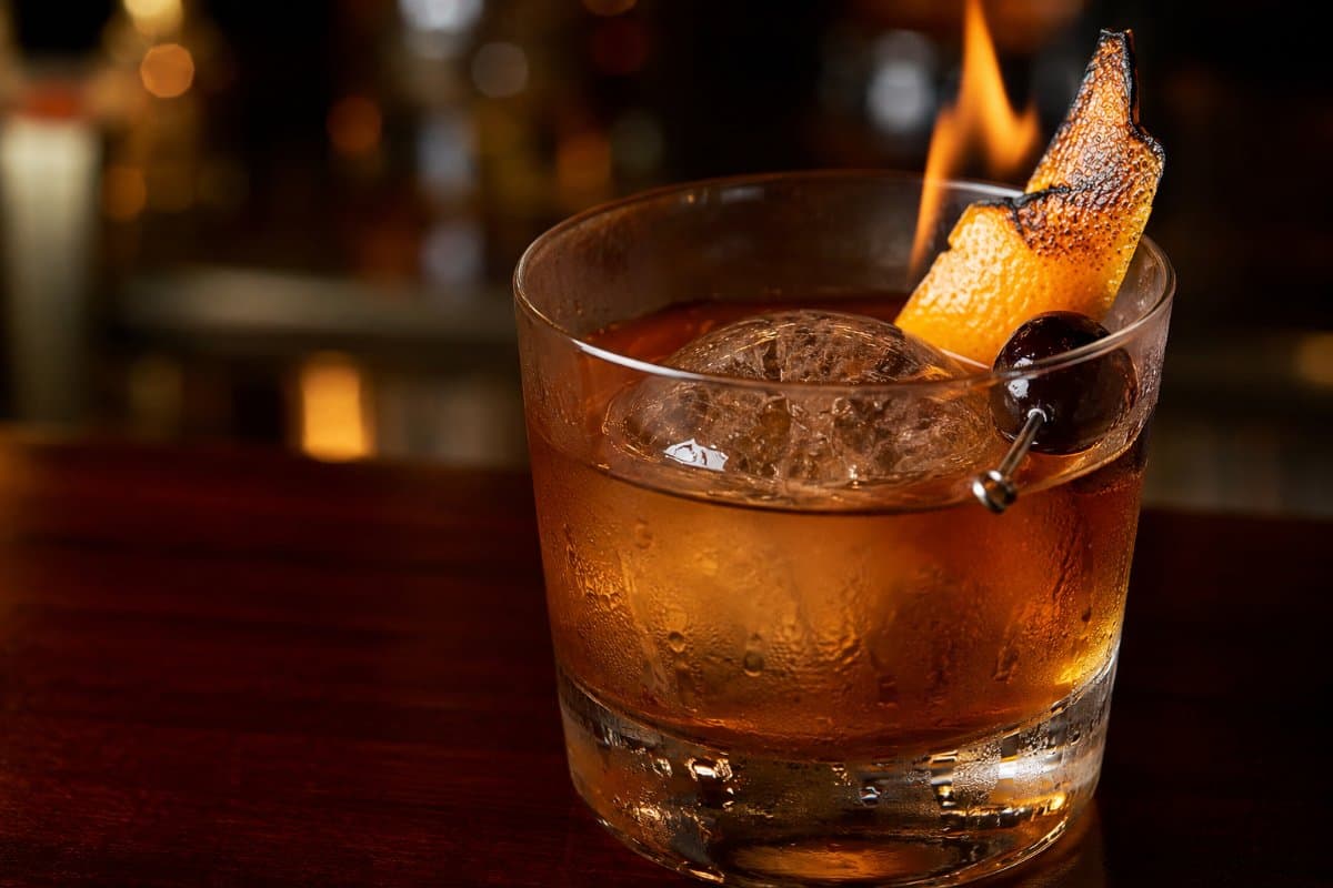 Old Fashioned cocktail - whiskey-based served in a glass with garnish