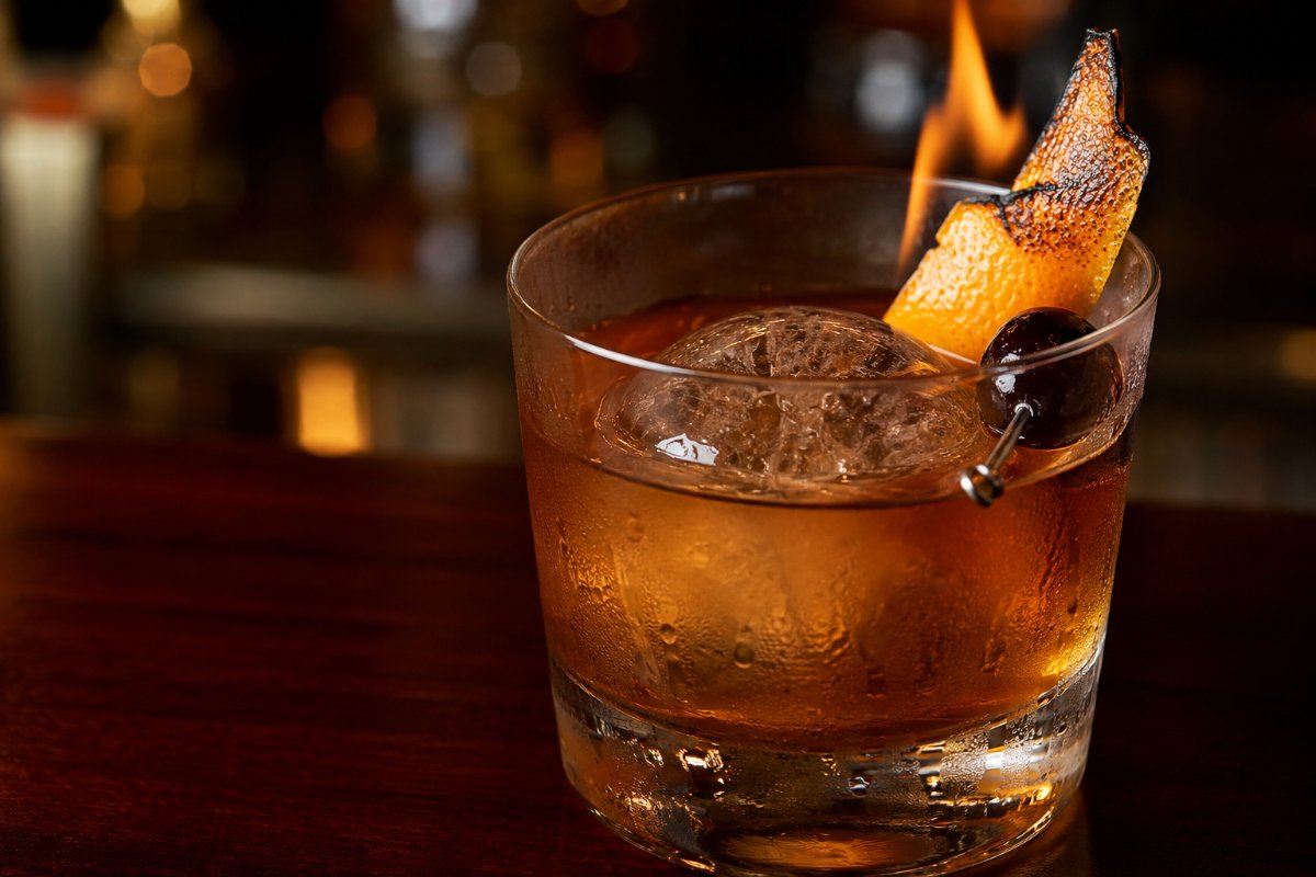 Old Fashioned cocktail - whiskey-based served in a glass with garnish