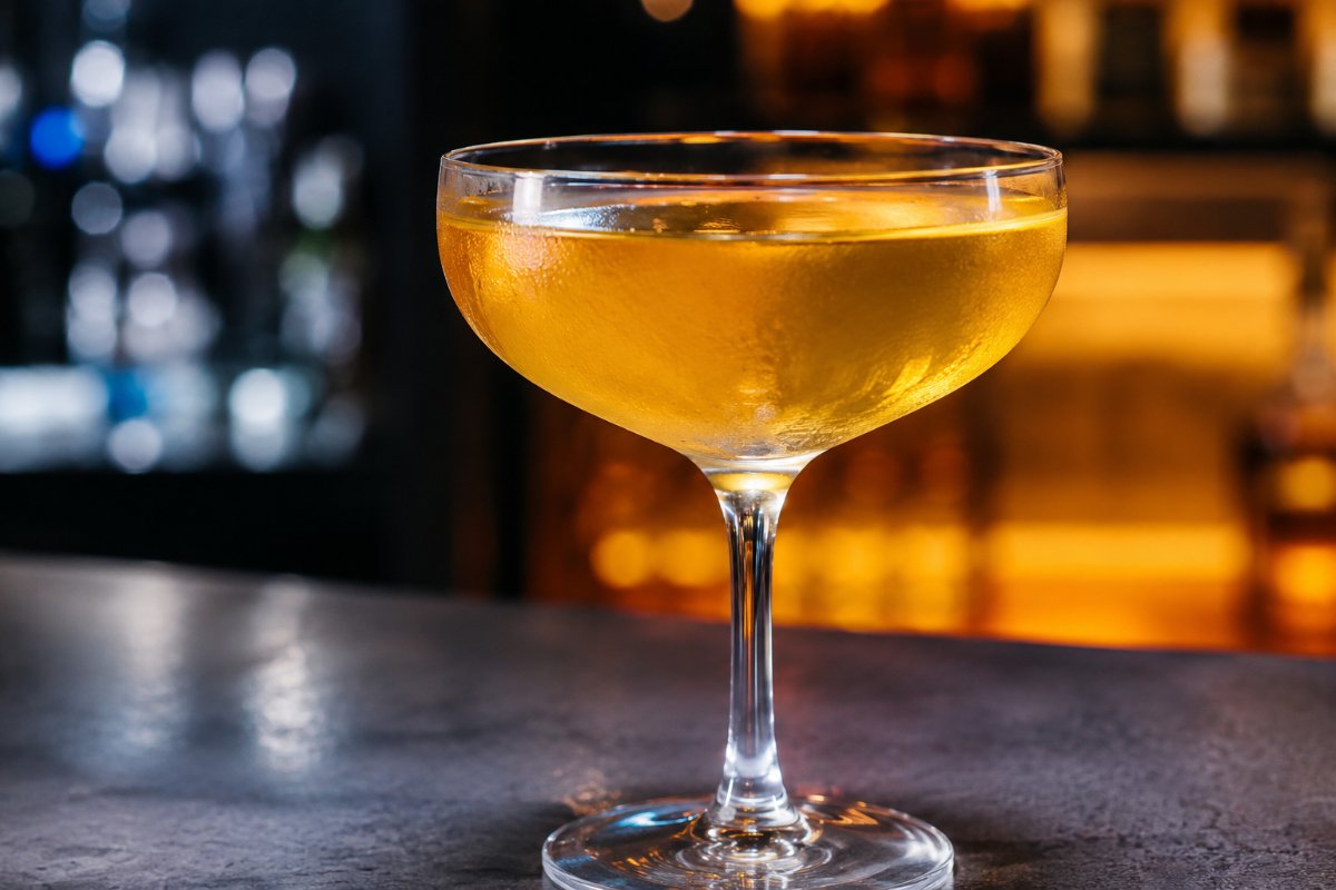 Paper Plane cocktail - whiskey-based served in a glass with garnish