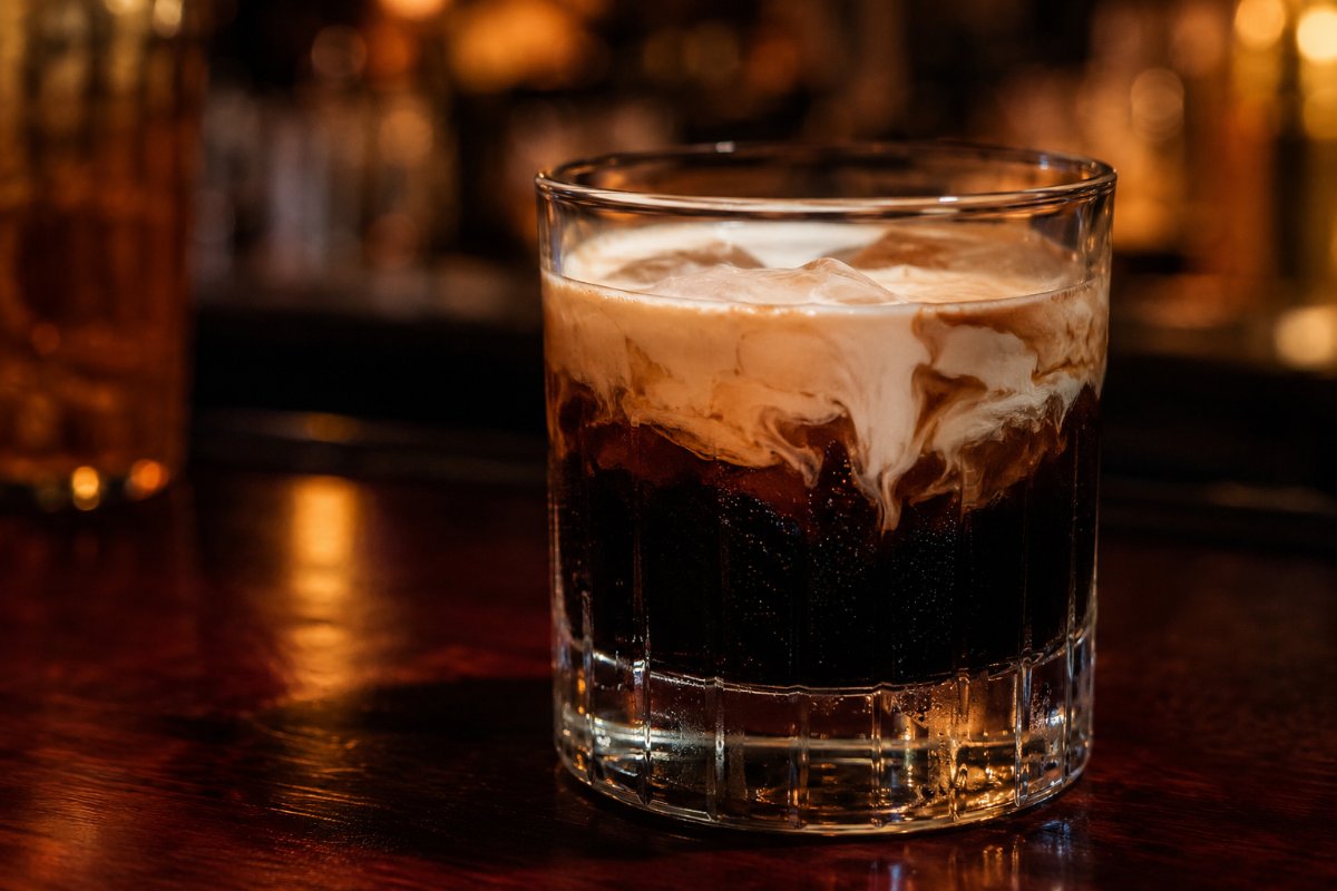 White Russian cocktail - vodka-based served in a glass with garnish