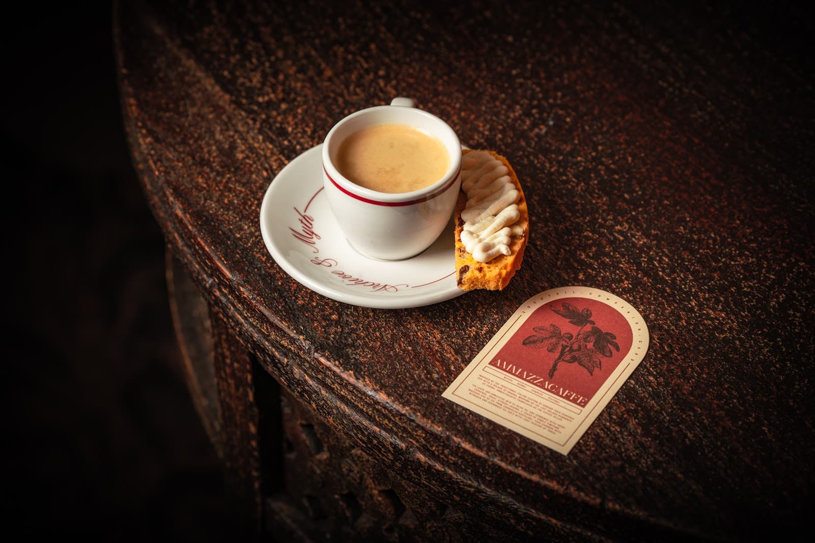 Espresso cup with biscotti on a rustic table. in London