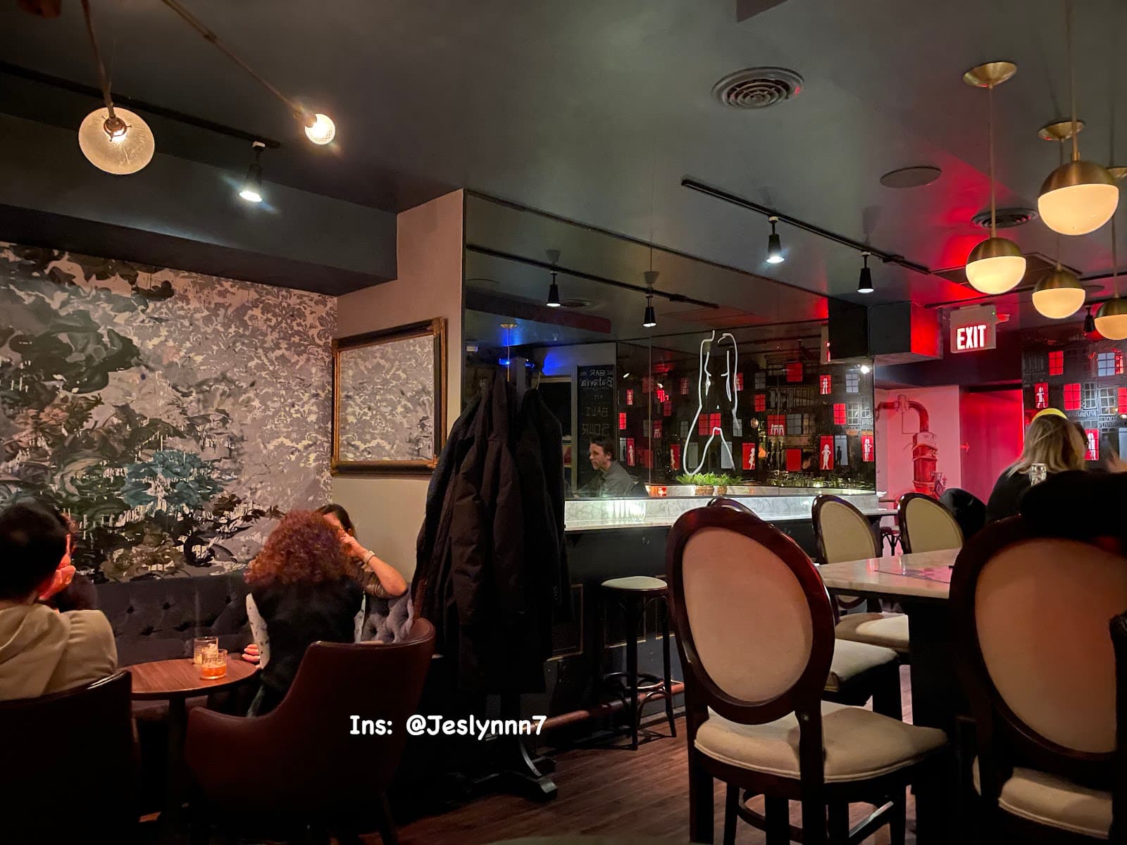 Cozy bar interior with red lighting and modern decor