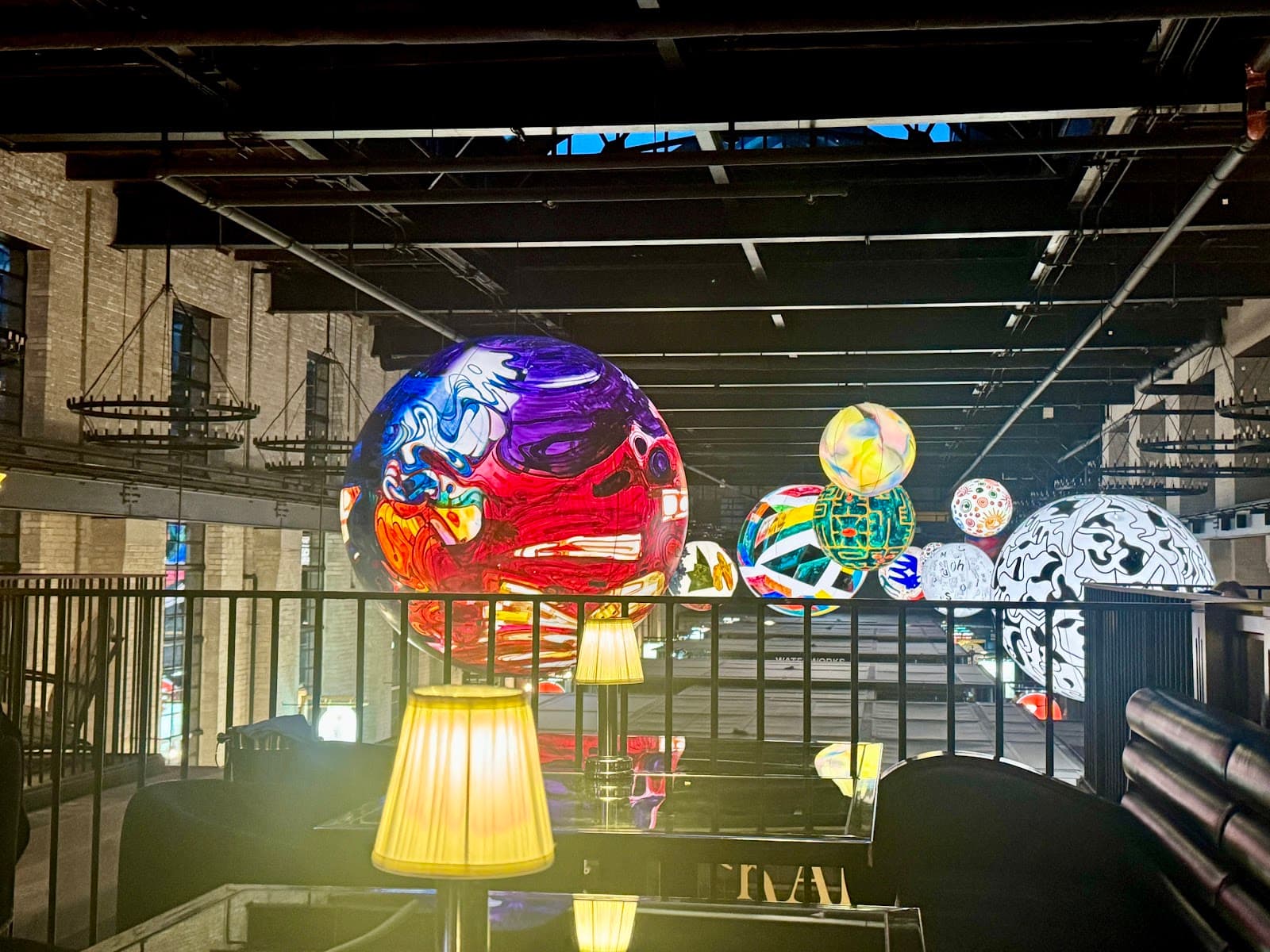 Modern interior with colorful art installations and bright lamps in Toronto