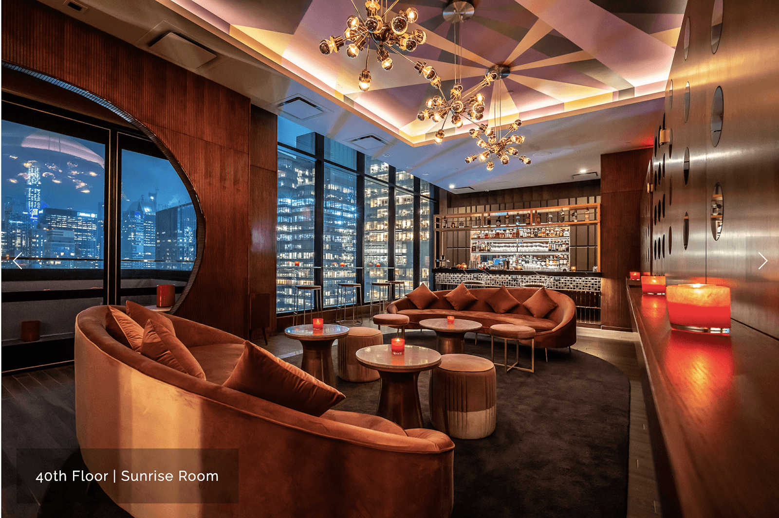 Elegant interior with skyline views and luxurious seating at the Sunrise Room on the 40th floor