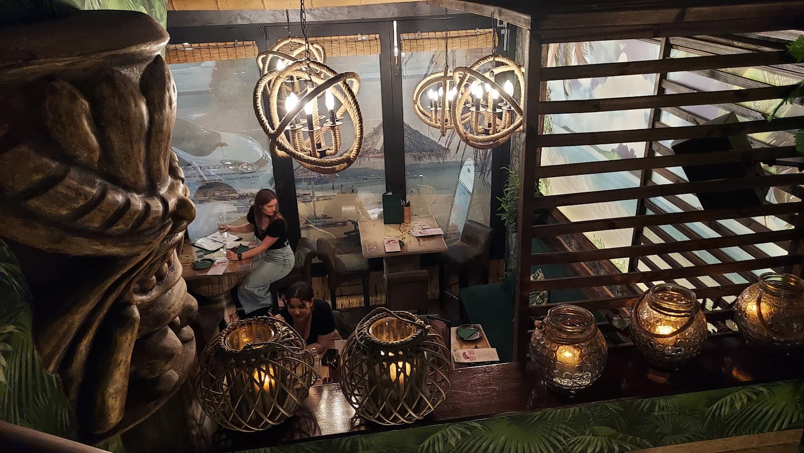 Interior with decorative lighting and a tiki decor theme in London