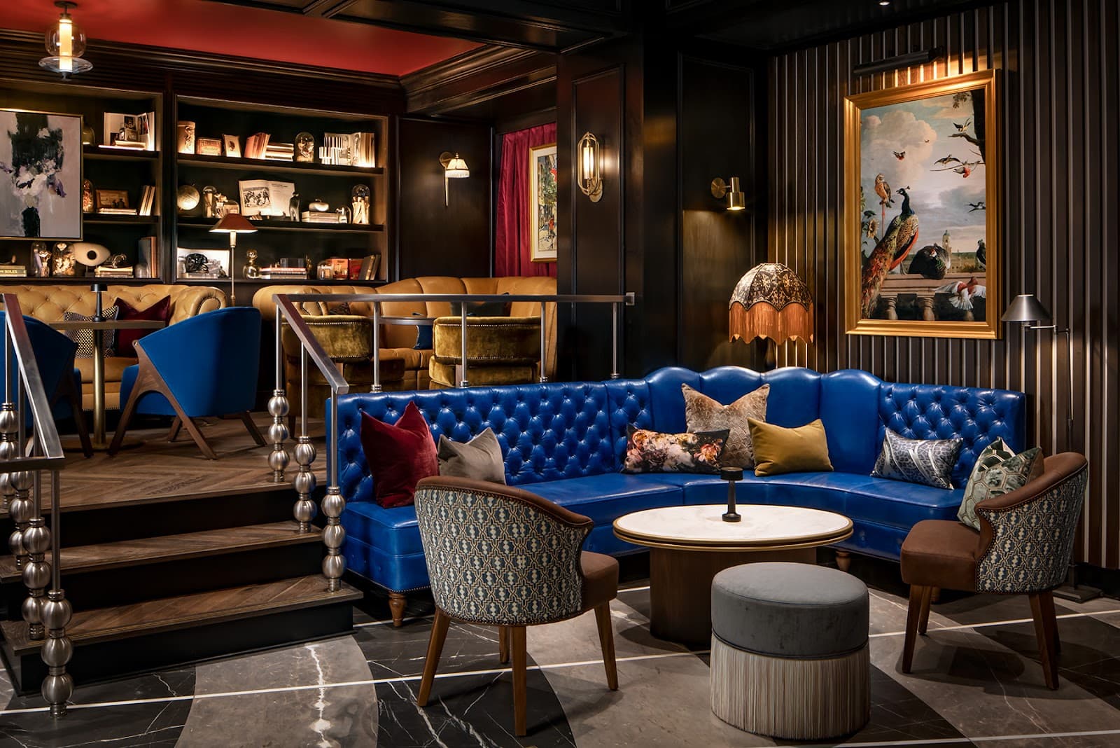 Luxurious interior with blue leather couches and decorative lighting