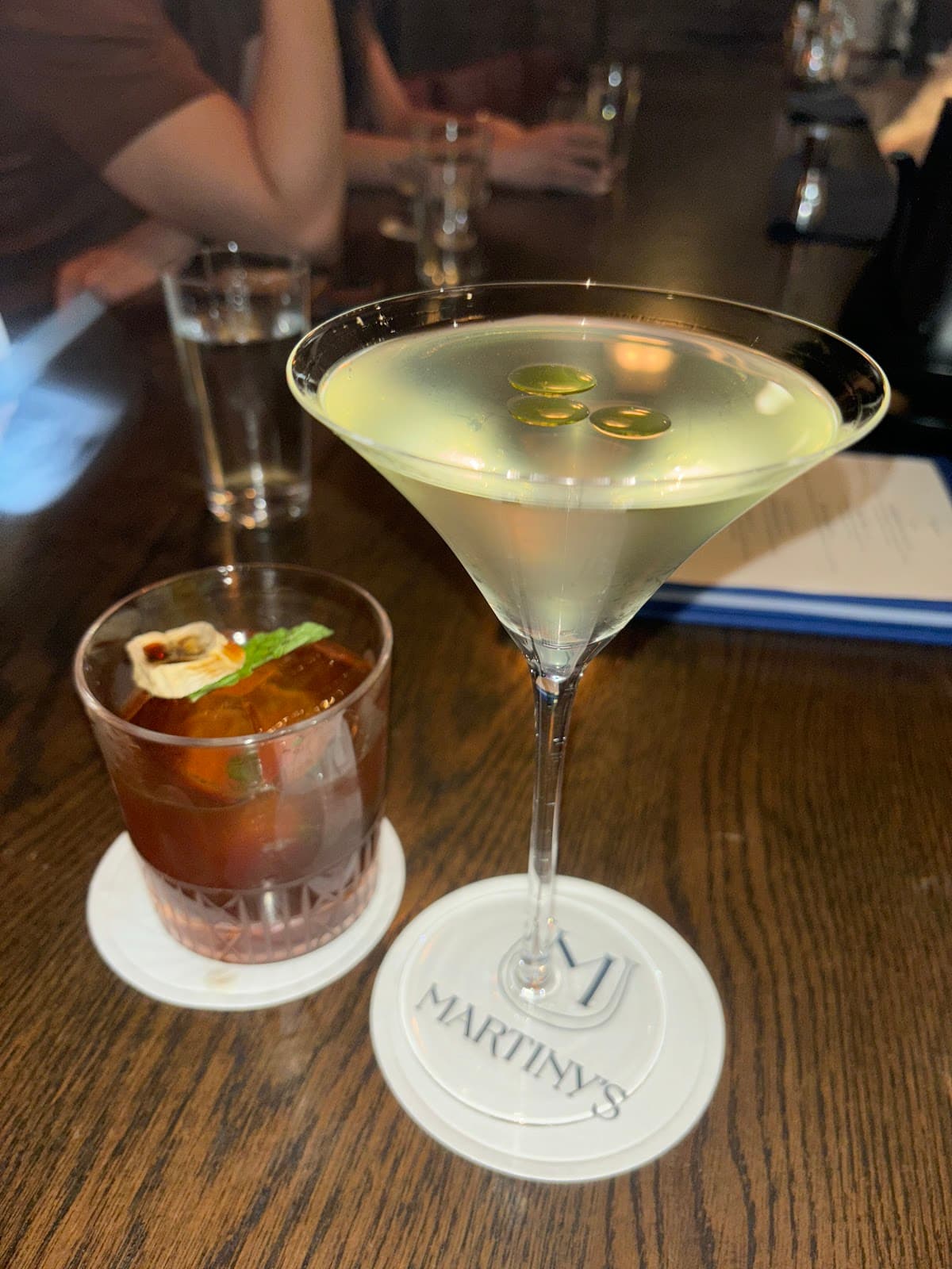 Close-up of cocktails on a bar counter at Martiny's in New York