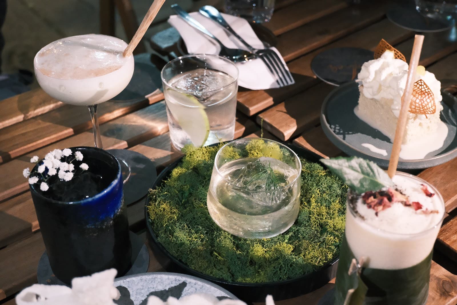 Artistic cocktail presentation on wooden table in Toronto