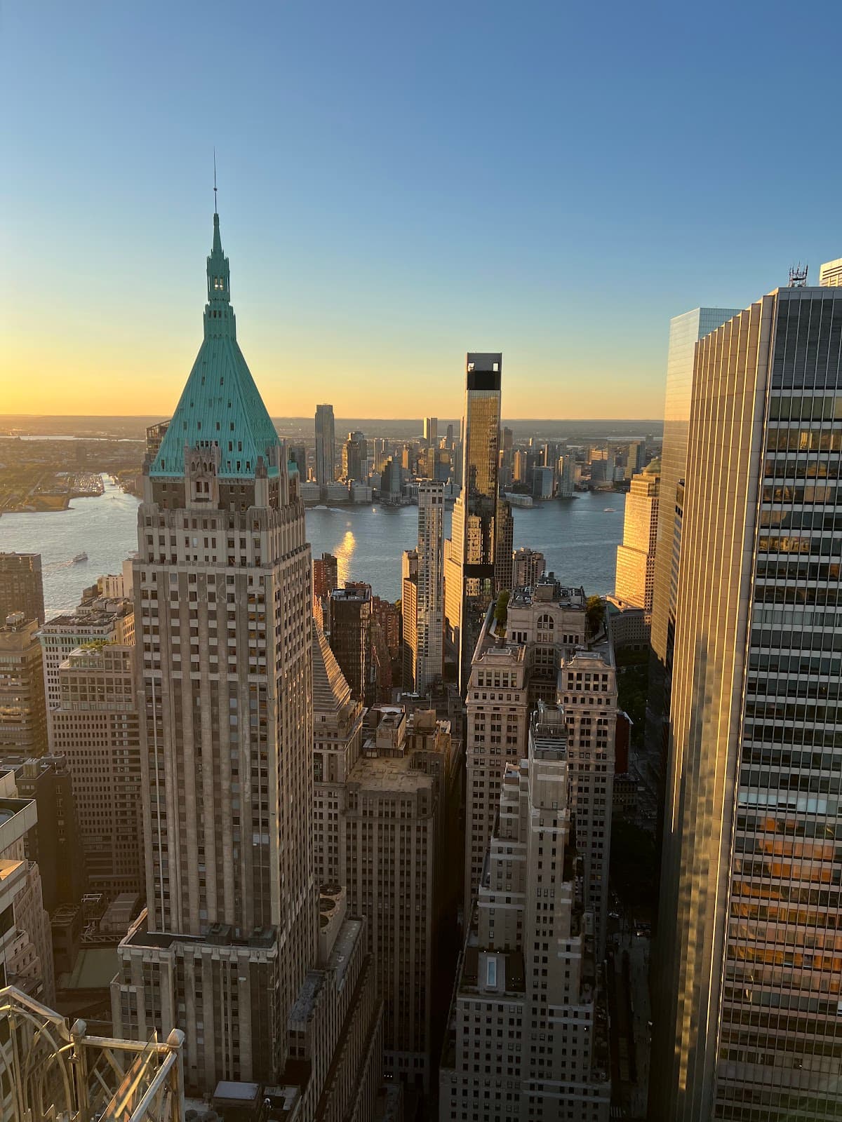Skyscraper skyline at sunset with river view in New York