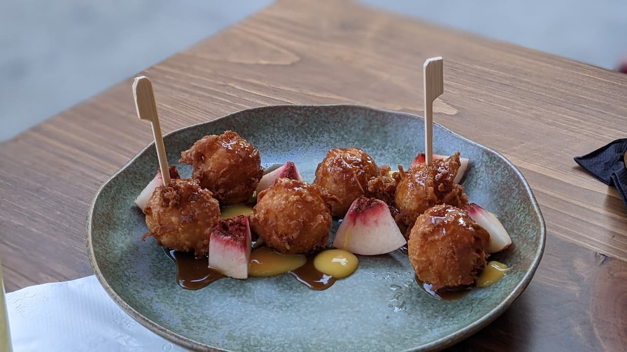 Plate of fried appetizers on a wooden table in San Francisco