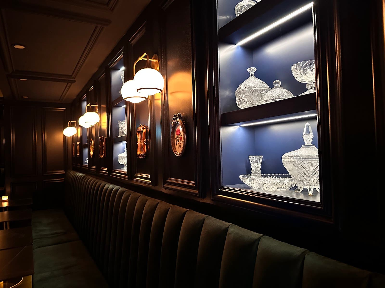 Elegant interior with crystal displays and plush seating in Toronto