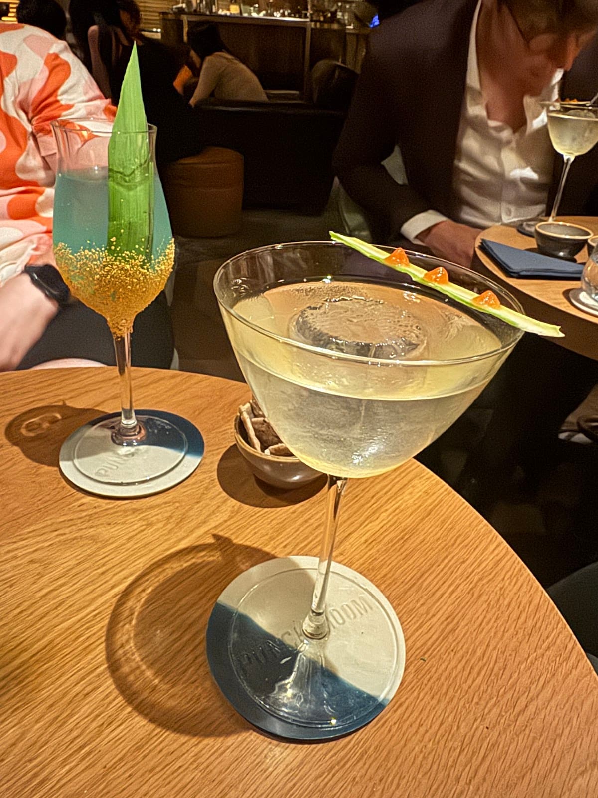 Close-up of cocktails on a wooden table at a bar in London