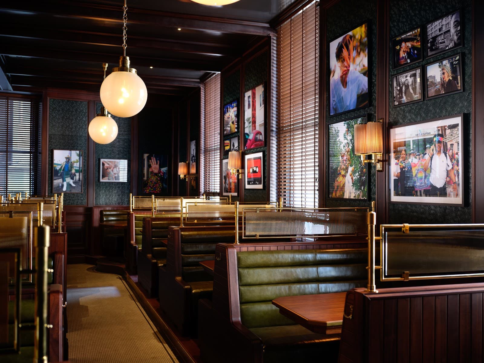 Stylish interior with leather booths and artwork on the walls