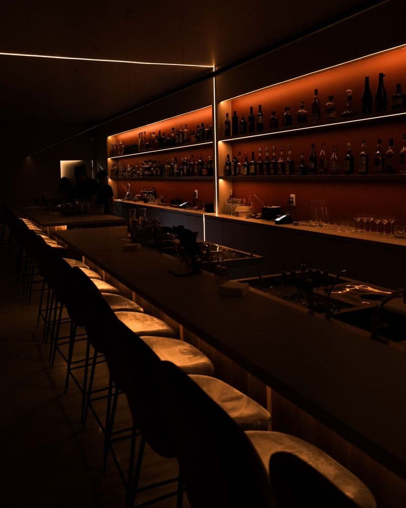 Suite 115 bar area with cocktails and spirits selection in Toronto