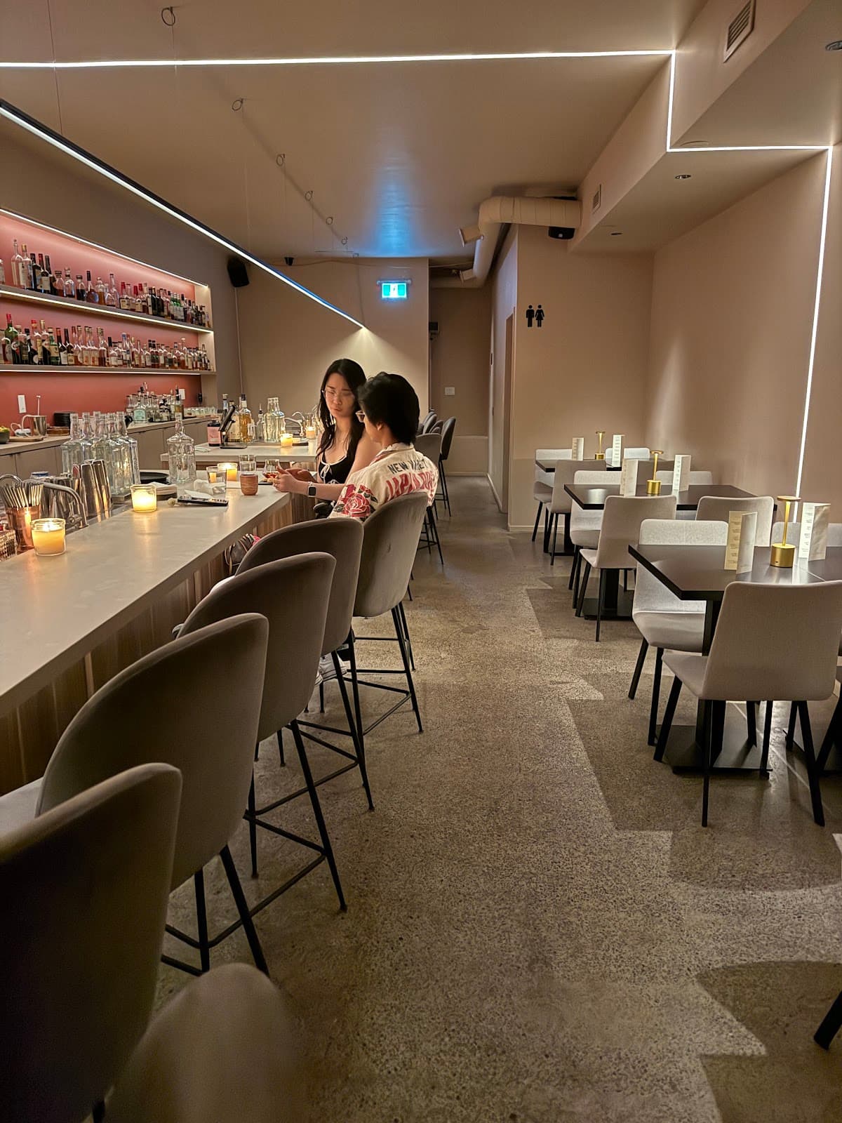 Suite 115 bar area with cocktails and spirits selection