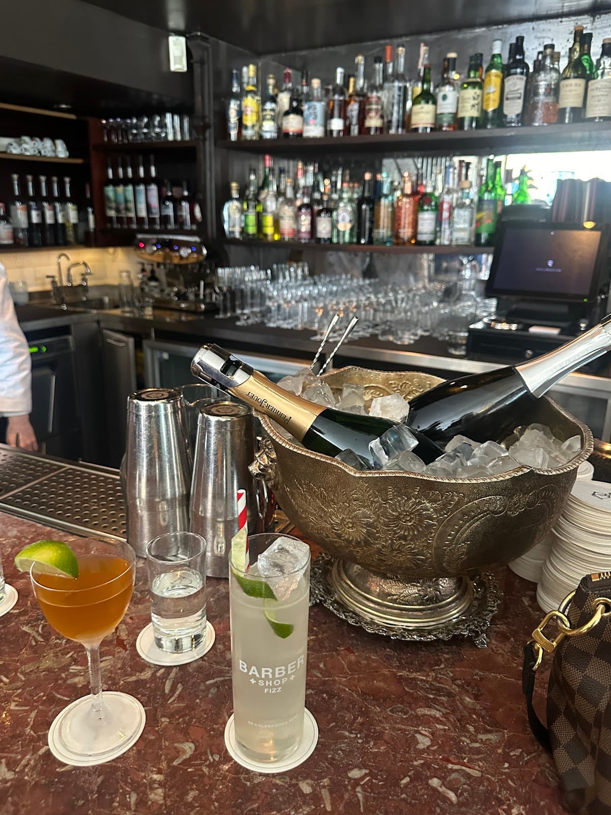 Close-up of a bar counter with cocktails and champagne. in London